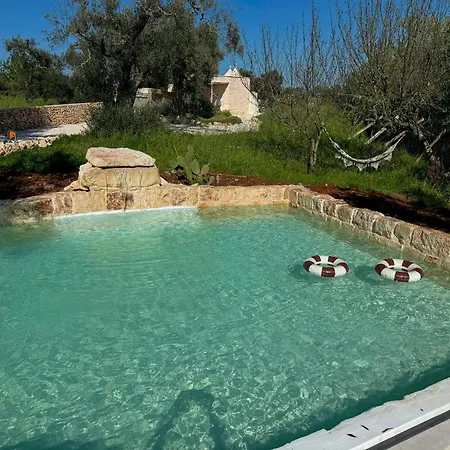 Trullo Among Ancient Olives In Valle D'itria Ostuni