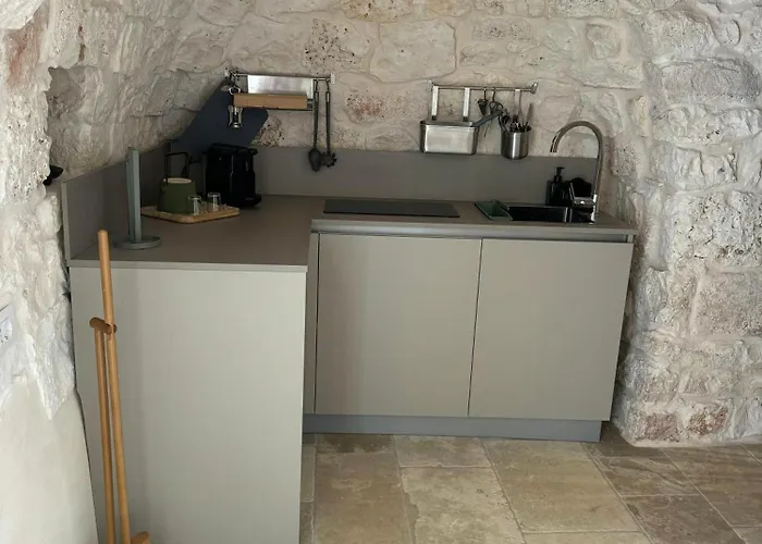 Trullo Among Ancient Olives In Valle D'itria *