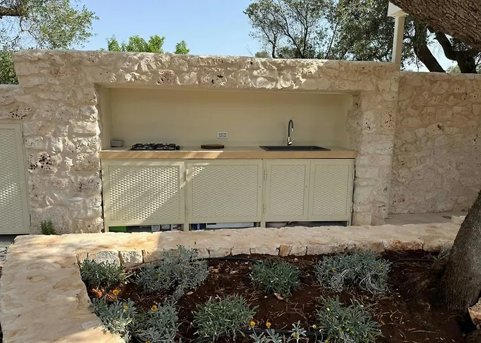 Trullo Among Ancient Olives In Valle D'itria